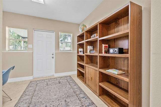 3300 Jackson St N, Saint Petersburg, FL 33704 - mudroom with light tile patterned flooring and baseboards