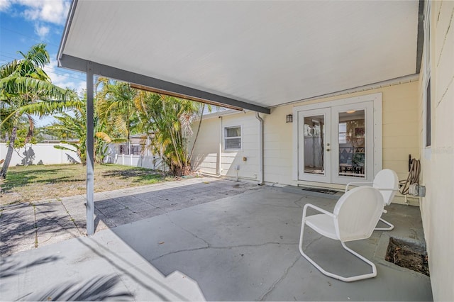 3300 Jackson St N, Saint Petersburg, FL 33704 - view of patio / terrace featuring fence and french doors