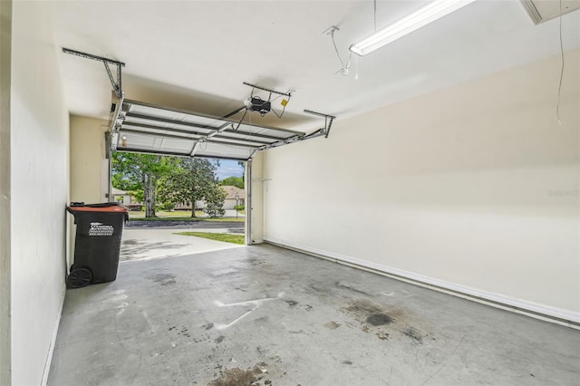 garage featuring a garage door opener