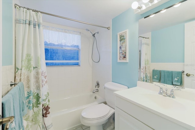 full bathroom with vanity, toilet, and shower / tub combo with curtain