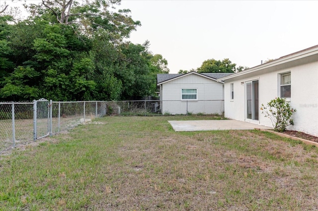 view of yard featuring a fenced backyard and a patio area