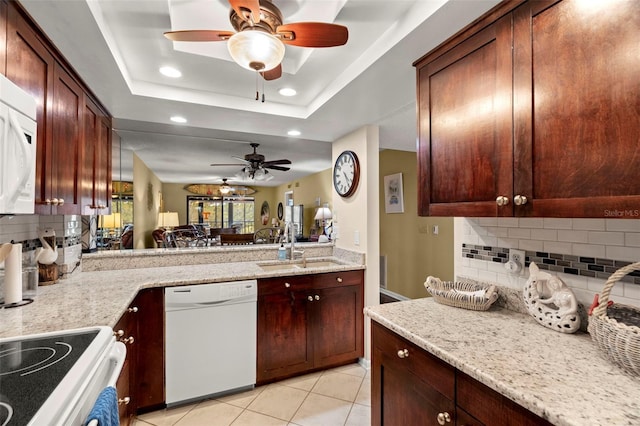 1817 Golfview Dr Unit 1817, Tarpon Springs, FL 34689 - kitchen with light tile patterned floors, recessed lighting, white appliances, a ceiling fan, and backsplash
