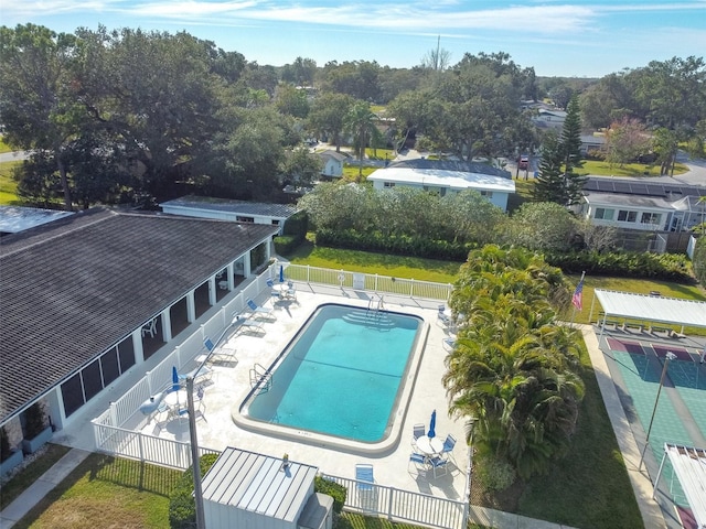pool with fence and a patio area