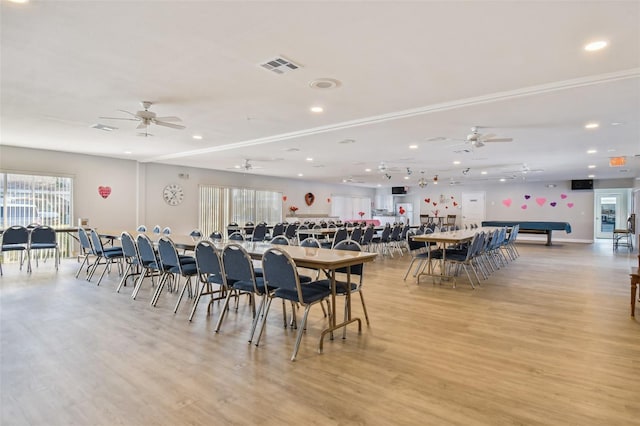 dining space with visible vents, a ceiling fan, light wood finished floors, and recessed lighting