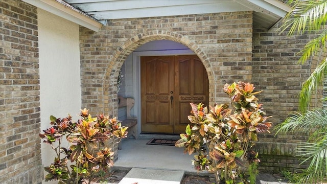 3808 Hollow Wood Dr, Valrico, FL 33594 - view of exterior entry with brick siding
