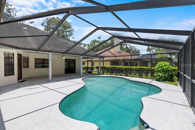 3808 Hollow Wood Dr, Valrico, FL 33594 - swimming pool with a patio, a ceiling fan, and a lanai