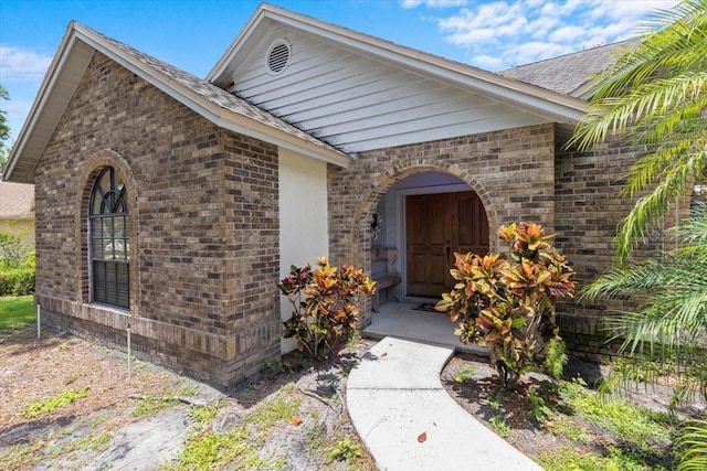 3808 Hollow Wood Dr, Valrico, FL 33594 - entrance to property featuring brick siding and a shingled roof