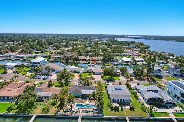 birds eye view of property featuring a water view and a residential view