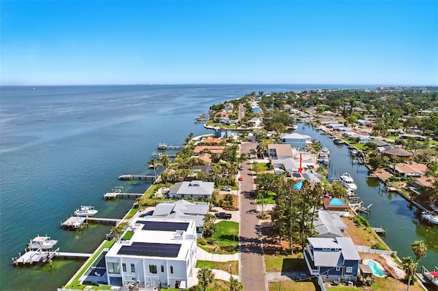 bird's eye view with a water view and a residential view