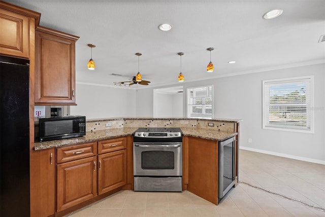 kitchen with a peninsula, brown cabinetry, black appliances, and wine cooler