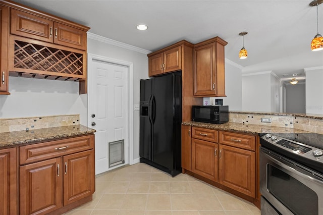 kitchen with crown molding, brown cabinetry, pendant lighting, stone countertops, and black appliances