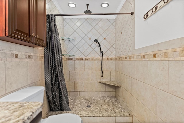 full bath with toilet, tile walls, recessed lighting, and a stall shower