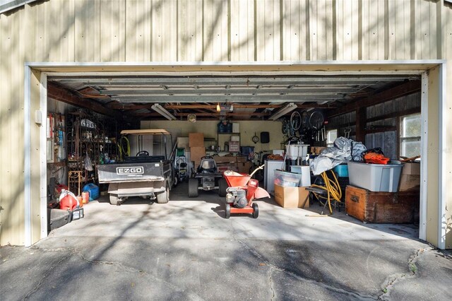 13015 Elm St, Odessa, FL 33556 - garage featuring a garage door opener
