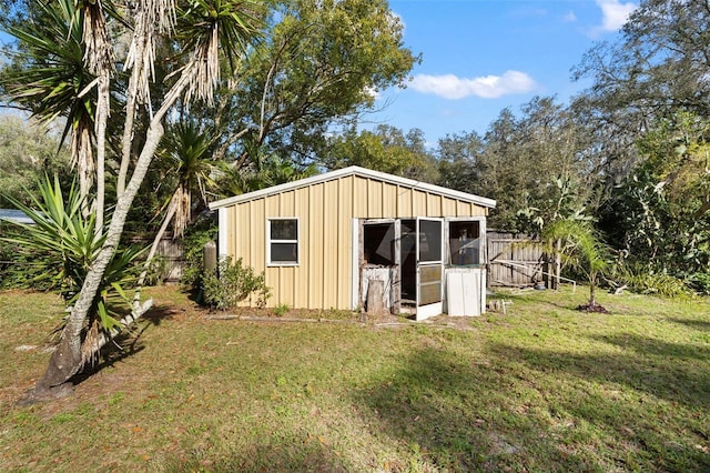13015 Elm St, Odessa, FL 33556 - view of outbuilding featuring fence and an outbuilding