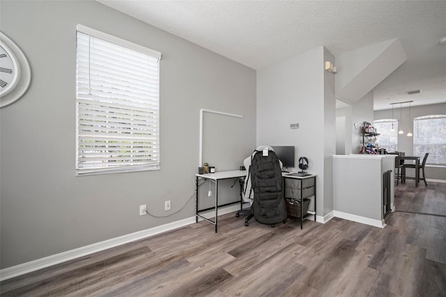 3056 Pointeview Dr, Tampa, FL 33611 - office with baseboards, a textured ceiling, and wood finished floors