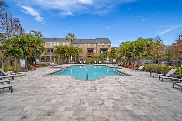 3056 Pointeview Dr, Tampa, FL 33611 - community pool featuring fence and a patio area