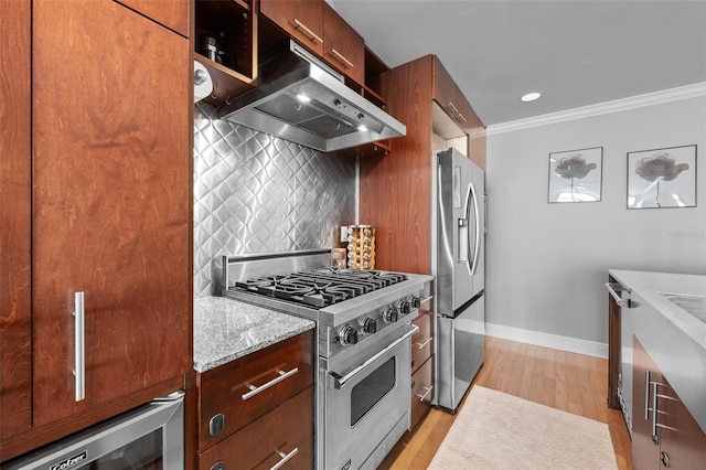 1120 E Kennedy Blvd Unit 1228, Tampa, FL 33602 - kitchen with appliances with stainless steel finishes, under cabinet range hood, baseboards, ornamental molding, and beverage cooler