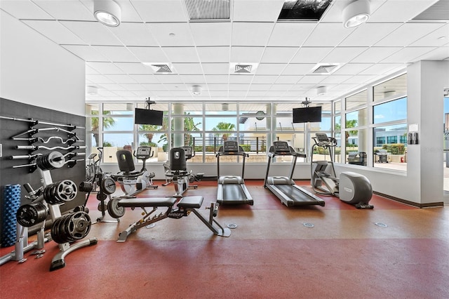 1120 E Kennedy Blvd Unit 1228, Tampa, FL 33602 - exercise room with a drop ceiling and baseboards