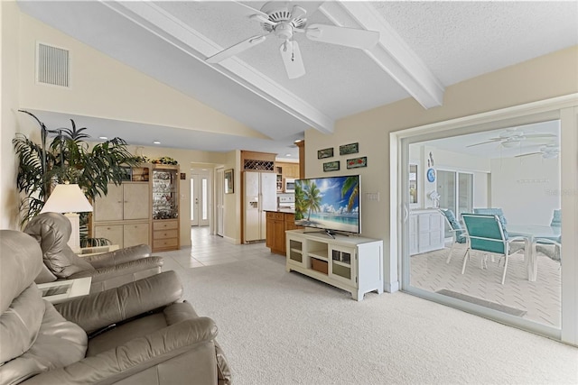 4333 48th Ave S, Saint Petersburg, FL 33711 - living area with a textured ceiling, ceiling fan, vaulted ceiling with beams, and visible vents