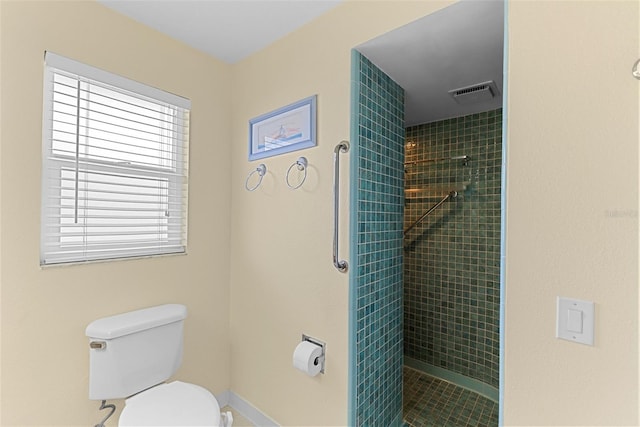 4333 48th Ave S, Saint Petersburg, FL 33711 - full bath featuring baseboards, a tile shower, and toilet