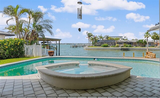 4333 48th Ave S, Saint Petersburg, FL 33711 - pool featuring a water view and an in ground hot tub