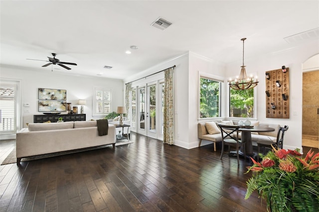 living room featuring visible vents, baseboards, recessed lighting, dark wood finished floors, and ceiling fan with notable chandelier