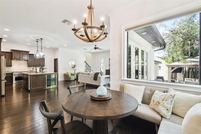 dining area with visible vents, recessed lighting, dark wood-style flooring, and wine cooler