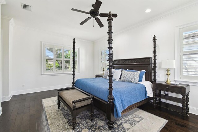 bedroom with hardwood / wood-style floors, baseboards, and visible vents