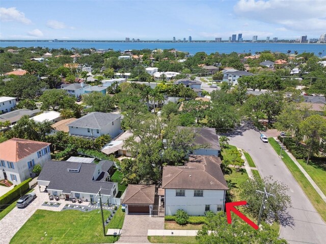 aerial view with a water view and a residential view