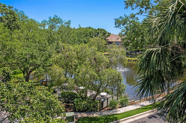 view of water feature with fence