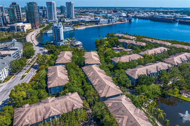 bird's eye view featuring a water view and a city view