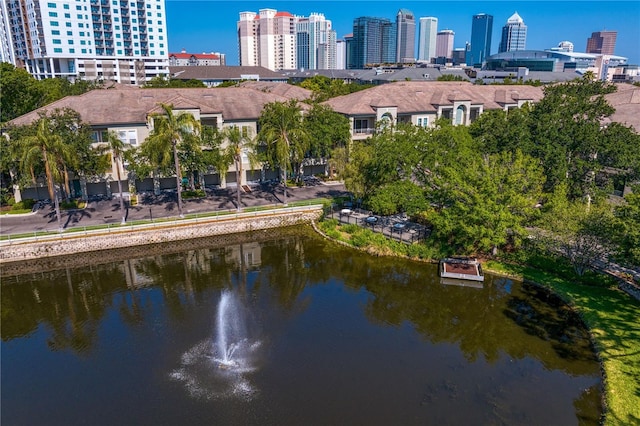 drone / aerial view with a view of city and a water view