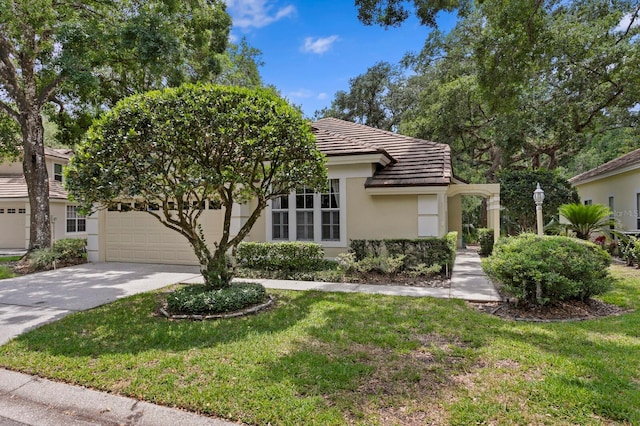 15314 Sherwood Forest Dr, Tampa, FL 33647 - view of front of house with stucco siding, a tiled roof, a front lawn, and driveway