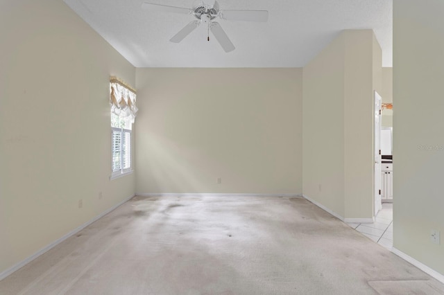 15314 Sherwood Forest Dr, Tampa, FL 33647 - empty room with light carpet, ceiling fan, and baseboards