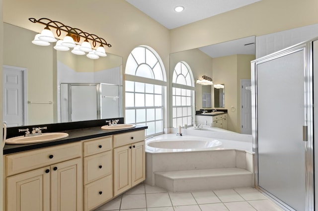 15314 Sherwood Forest Dr, Tampa, FL 33647 - bathroom featuring a shower stall, a bath, double vanity, and tile patterned floors