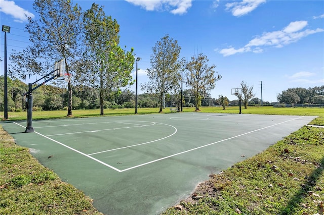 15314 Sherwood Forest Dr, Tampa, FL 33647 - view of sport court with community basketball court and a lawn