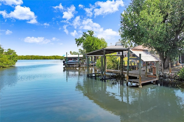 dock area featuring a water view and boat lift