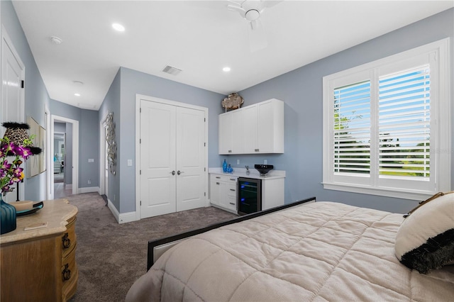 17305 Ballmont Park Dr, Odessa, FL 33556 - carpeted bedroom featuring recessed lighting, a closet, baseboards, visible vents, and wine cooler