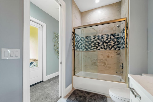 17305 Ballmont Park Dr, Odessa, FL 33556 - bathroom with enclosed tub / shower combo, toilet, vanity, and baseboards