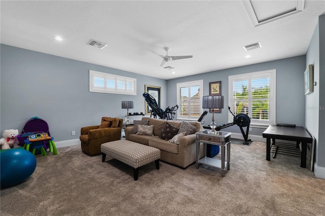 17305 Ballmont Park Dr, Odessa, FL 33556 - living room with attic access, visible vents, carpet floors, and baseboards
