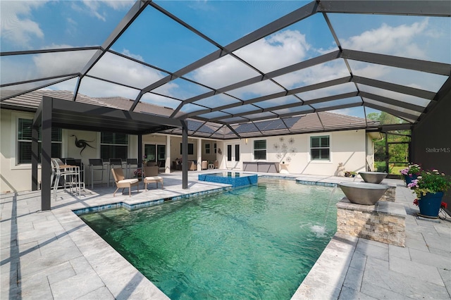 17305 Ballmont Park Dr, Odessa, FL 33556 - view of swimming pool with a lanai, a patio area, outdoor dry bar, and a pool with connected hot tub