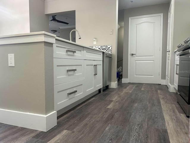 interior space featuring wood finished floors and baseboards