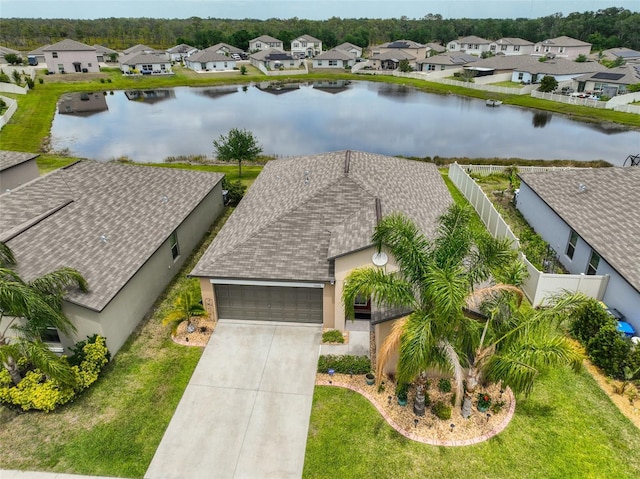15426 Wicked Strong St, Sun City Center, FL 33573 - aerial view of residential area with a nearby body of water
