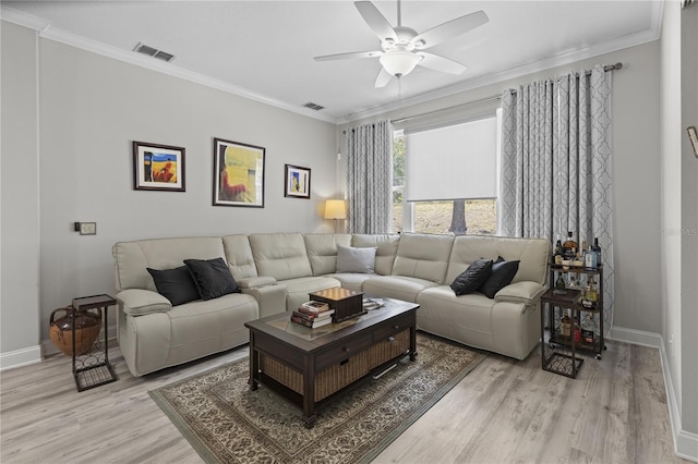 9723 Rolling Cir, San Antonio, FL 33576 - living room featuring visible vents, ornamental molding, ceiling fan, and wood finished floors