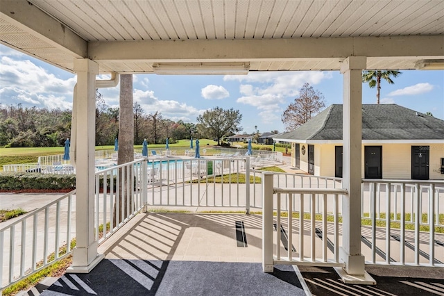 9723 Rolling Cir, San Antonio, FL 33576 - view of patio with a community pool