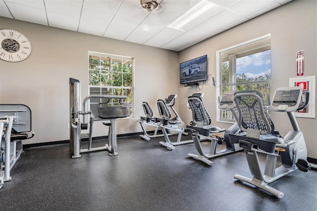 9723 Rolling Cir, San Antonio, FL 33576 - gym featuring baseboards and a drop ceiling