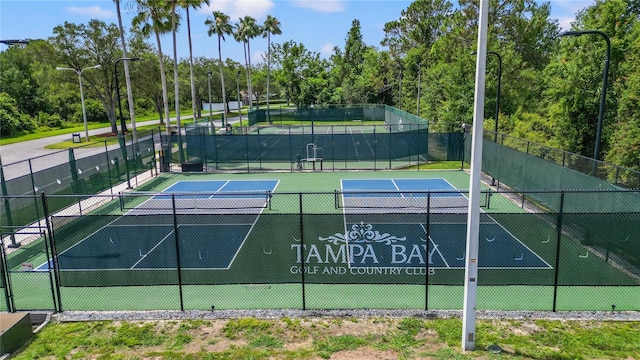 9723 Rolling Cir, San Antonio, FL 33576 - view of tennis court featuring fence