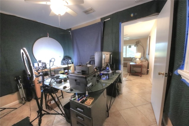 home office featuring ceiling fan, visible vents, and tile patterned floors