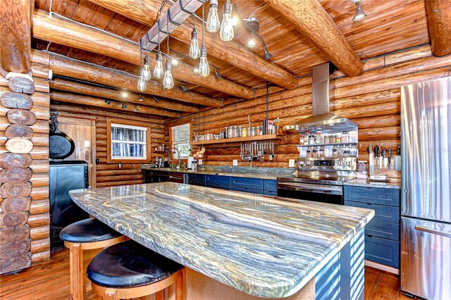 4126 Burrows Rd, Zephyrhills, FL 33542 - bar featuring wall chimney range hood, wood ceiling, stainless steel appliances, hardwood / wood-style floors, and beam ceiling