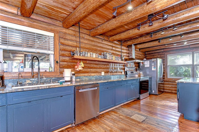 4126 Burrows Rd, Zephyrhills, FL 33542 - kitchen featuring a sink, stainless steel appliances, blue cabinets, wooden ceiling, and wine cooler